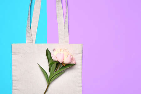 Eco bag with flower on color backgroundの写真素材