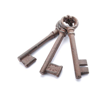 Old keys on white backgroundの写真素材