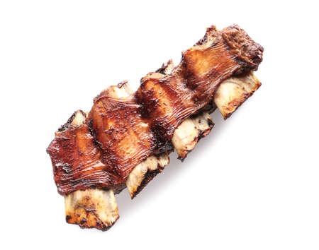 Tasty beef short ribs on white background