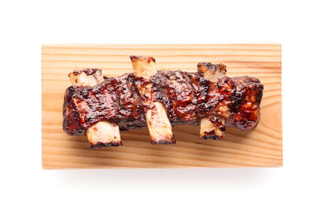 Tasty beef short ribs on white background