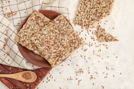 Plate with cereal cookies on white backgroundの写真素材