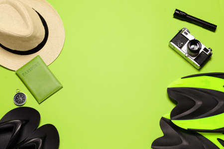 Set of travel accessories for men on color backgroundの写真素材