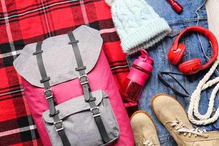 Set of traveler's accessories on wooden backgroundの写真素材