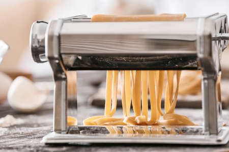 Preparing of pasta with machine, closeupの写真素材