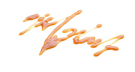 Liquid caramel on white background