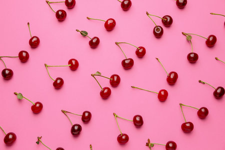 Ripe sweet cherry on color background