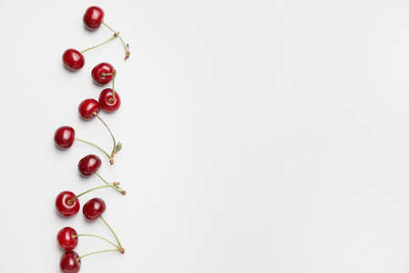 Ripe sweet cherry on light background