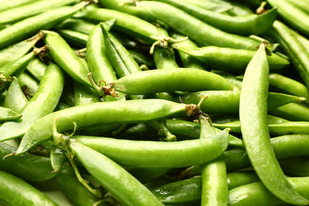 Tasty fresh peas as background