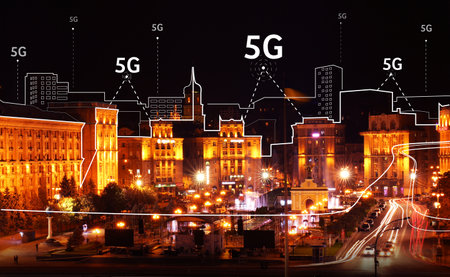 View of modern illuminated city at night. Concept of internet