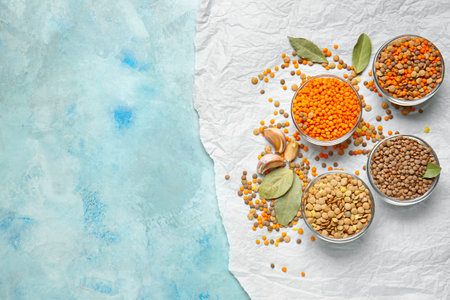 Bowls with lentils on color backgroundの写真素材