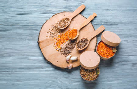 Different raw lentils on tableの写真素材