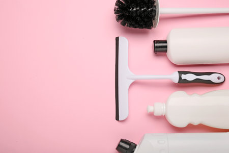 Set of cleaning supplies on color background