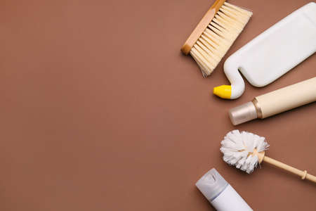 Set of cleaning supplies on color backgroundの写真素材