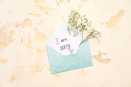 Letter with text I AM SORRY on white backgroundの写真素材
