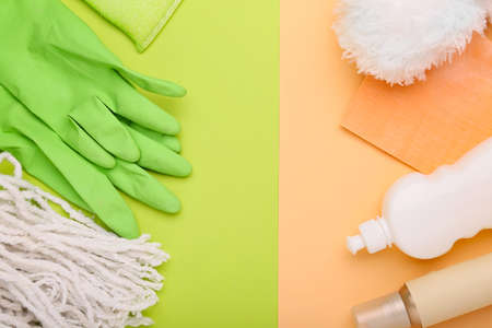 Set of cleaning supplies on color backgroundの写真素材