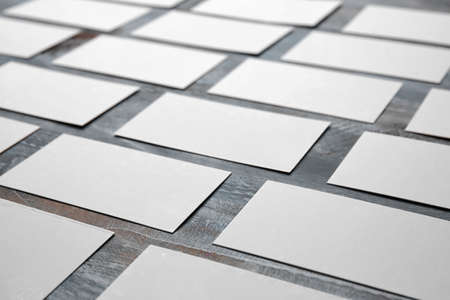 Blank business cards on wooden backgroundの写真素材