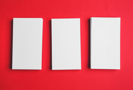Blank business cards on color background