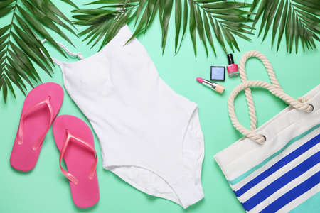 Summer composition with beach accessories on color backgroundの写真素材