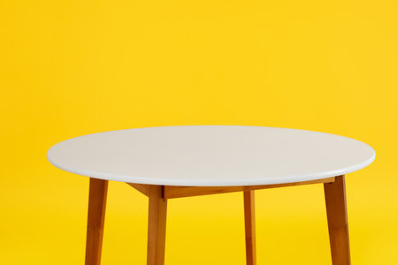 Dining table on color backgroundの写真素材