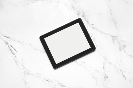 Modern tablet computer on light backgroundの写真素材