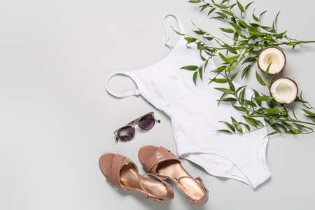 Summer composition with beach accessories on light backgroundの写真素材