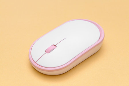 Modern computer mouse on color background