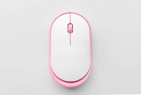 Modern computer mouse on light background