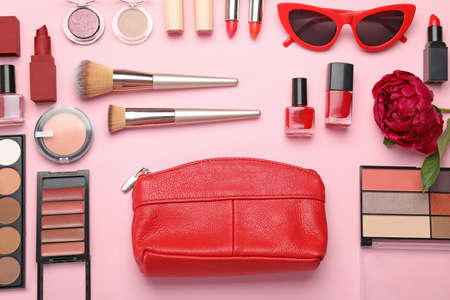 Set of decorative cosmetics and accessories on color backgroundの写真素材