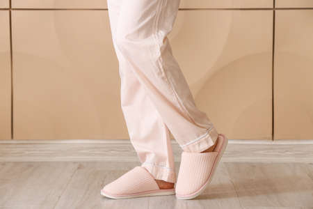 Woman in soft slippers at home