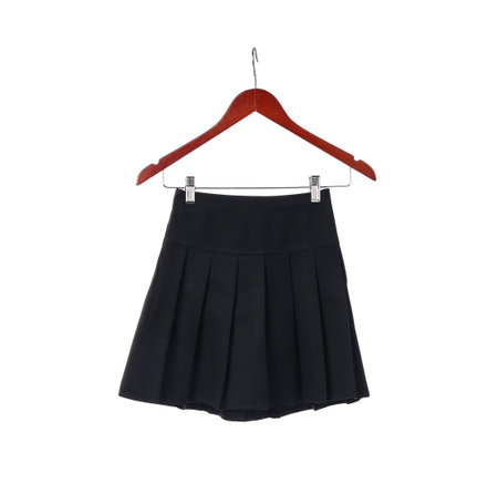 Hanger with stylish school uniform on white backgroundの写真素材