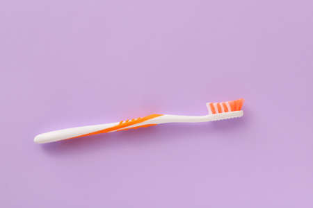 Tooth brush on color background