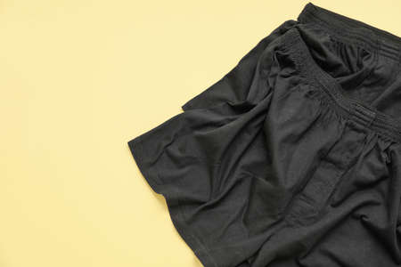 Stylish male trunks on color backgroundの写真素材