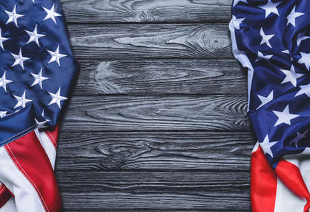 USA flag on dark wooden backgroundの写真素材