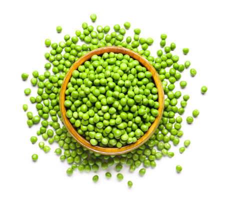 Plate with tasty fresh peas on white backgroundの写真素材