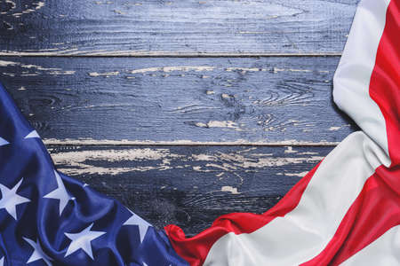 USA flag on dark wooden backgroundの写真素材