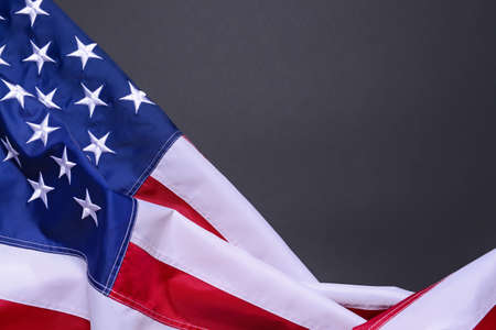 USA flag on dark backgroundの写真素材