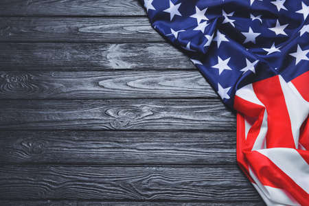 USA flag on dark wooden backgroundの写真素材