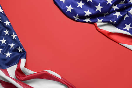 USA flags on color backgroundの写真素材