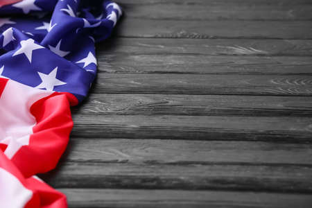 USA flag on dark wooden background