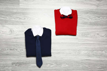Stylish school uniform on wooden backgroundの写真素材