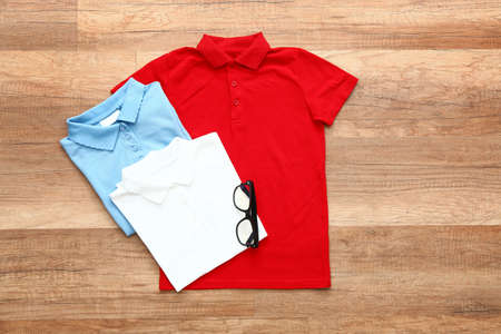 Stylish school uniform on wooden backgroundの写真素材