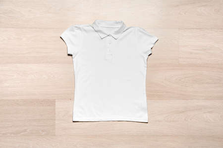 Stylish school uniform on wooden backgroundの写真素材