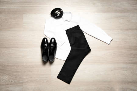 Stylish school uniform on wooden backgroundの写真素材