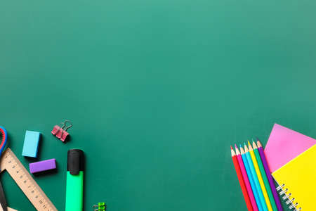 Set of school stationery on blackboardの写真素材