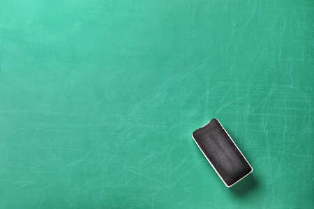 Sponge on chalkboard, top viewの写真素材