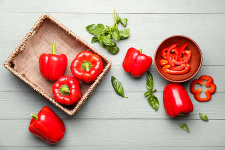 Composition with red bell pepper on table
