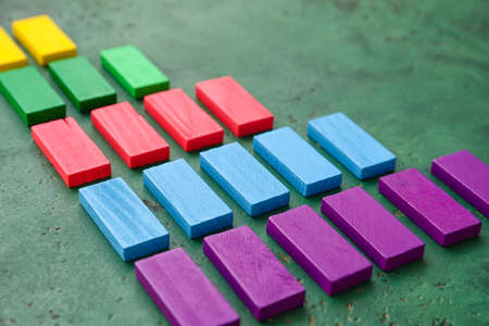 Wooden blocks on color background