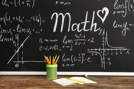 Stationery on desk in classroomの写真素材