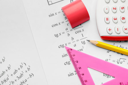 School stationery and paper with formulas, closeupの写真素材