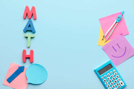 Composition with word MATH and stationery on color backgroundの写真素材